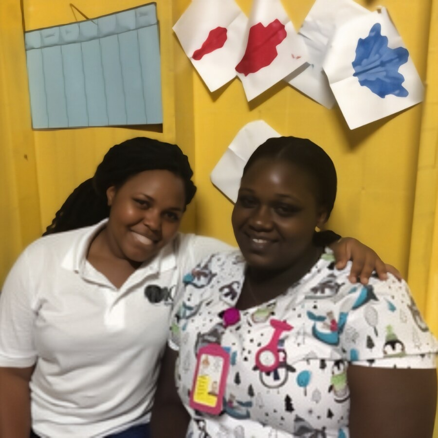 Two members of the local clinic staff who worked alongside our team