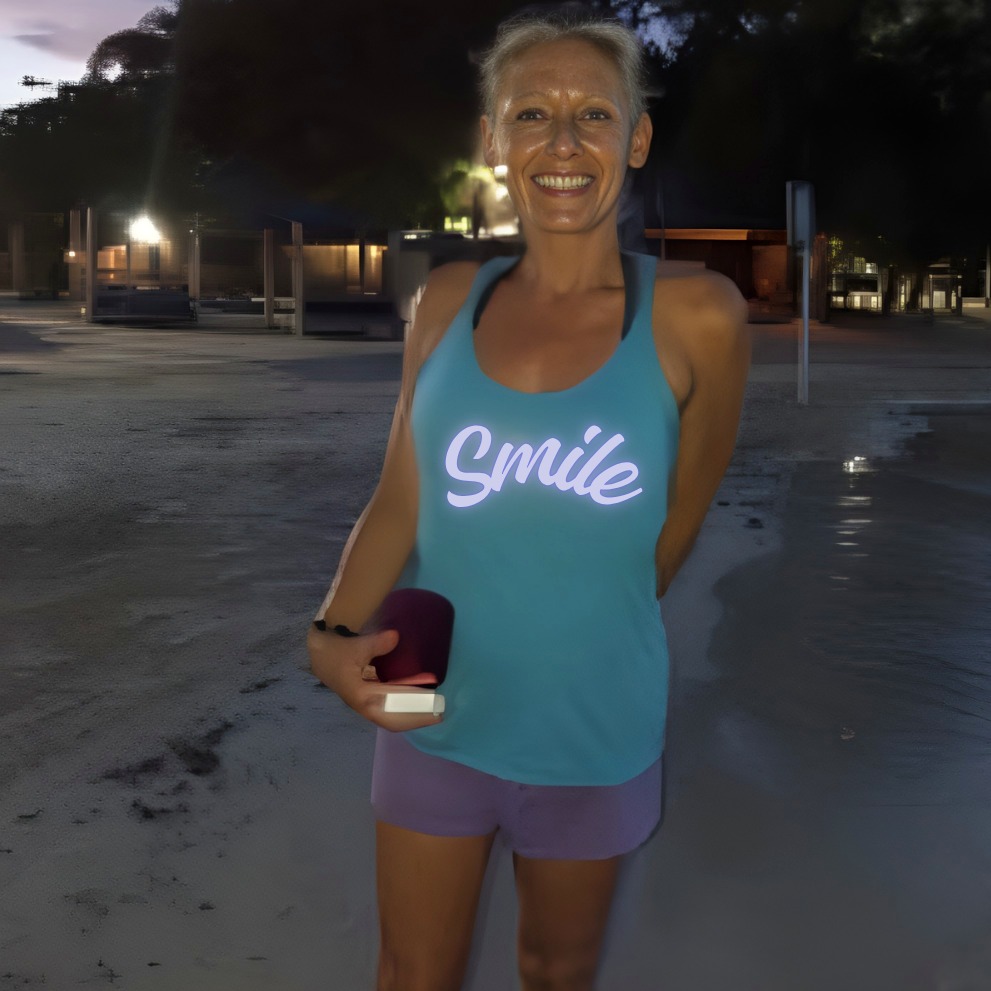 A volunteer in a Will to Smile shirt in Jamaica