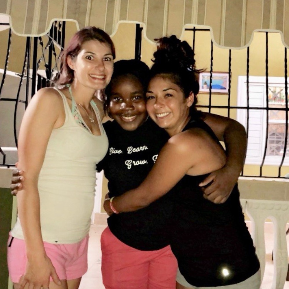 Volunteers with a local friend in Jamaica